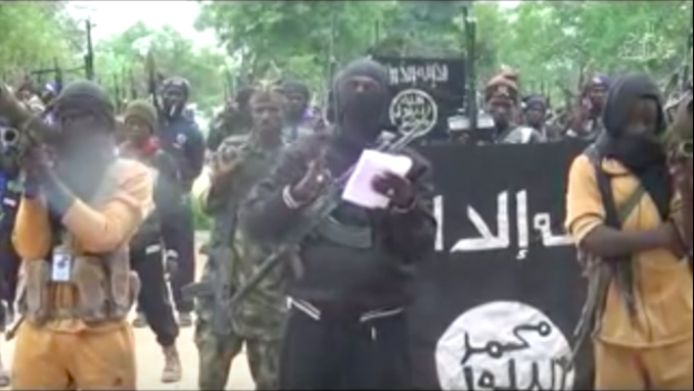 First speaker surrounded by Boko Haram fighters. 